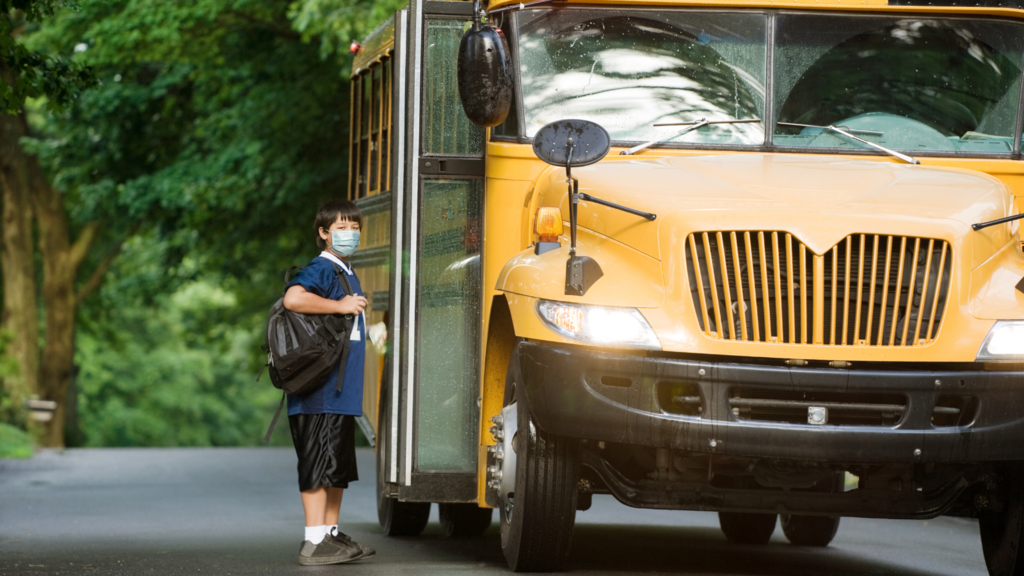 School Bus Student in Mask