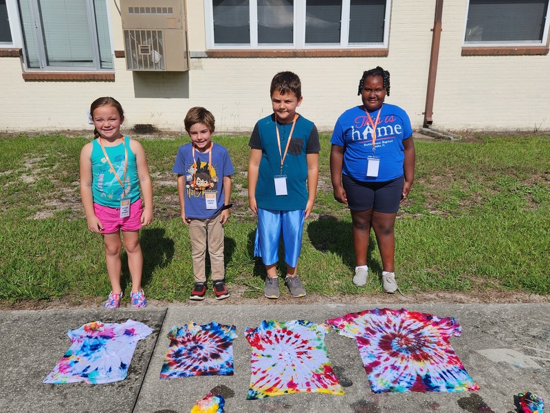 L-R: Kytalin, Lincoln, Trenton and Damiya pose in front of the tie-dyed T-shirts they made.